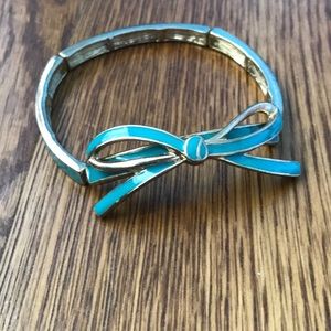 Charming Charlie’s blue bow bracelet stretches